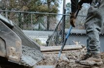 a person digging in the dirt